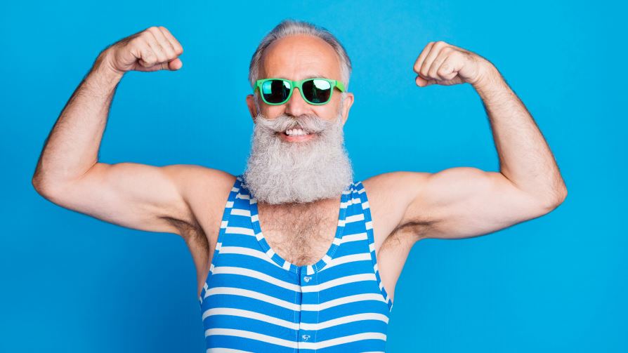 Old man showing his biceps