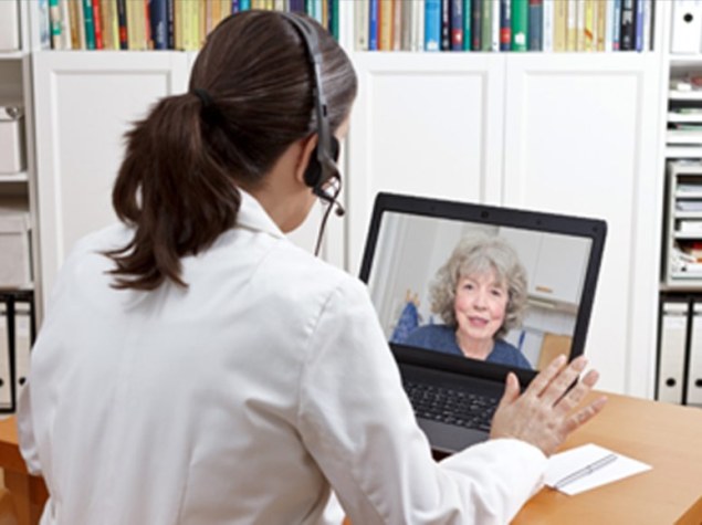 nurse with patient computer