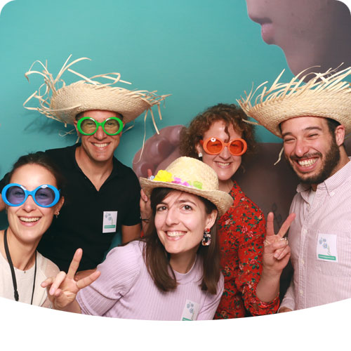 MSD employees funny photo shoot straw hats glasses smiles